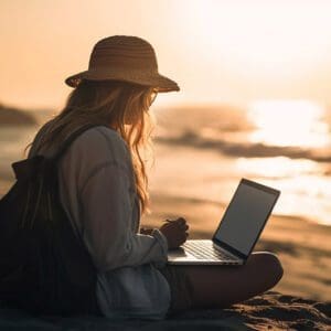 Young woman typing on laptop, enjoying solitude
